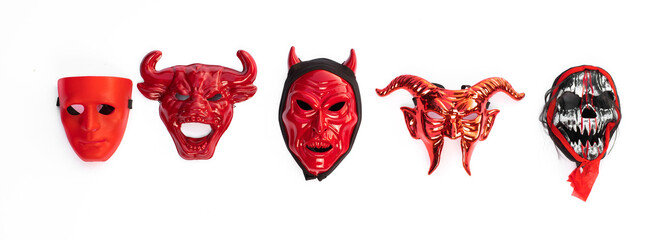 collection of red devil masks isolated on white background