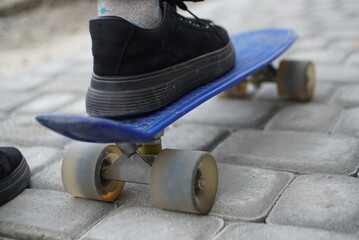 Feet On A Skateboard Close-Up