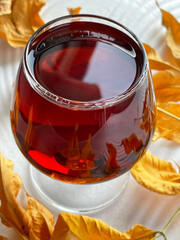 glass with cognac autumn leaf brandy whiskey drink alcohol