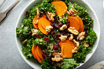 Fall salad with kale, walnuts and persimmon