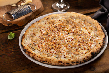 Cheese, clams and chili flakes pizza, freshly baked