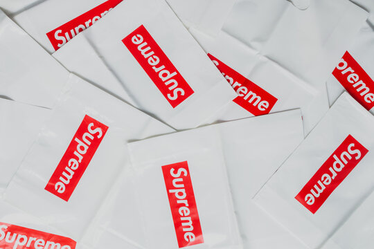 Supreme box logo bags scattered on floor display after being acquired by the VF Corporation