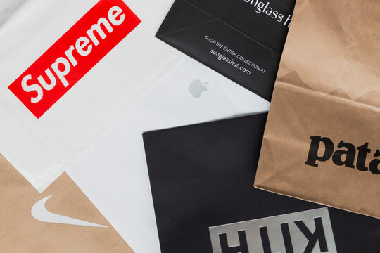 Bags of fashion brands Supreme, Patagonia, Kith, Nike, Apple