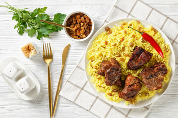 roasted meat served with raisins saffron rice