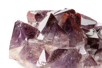 Macro mineral stone Amethysts, Goethite, Epidote on a white background