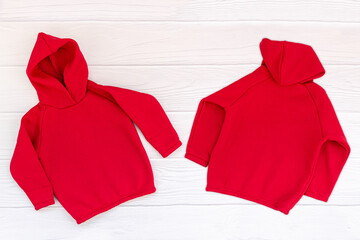 Red kids sweatshirt blank hoodie in front and back view. Fashionable unisex clothing, hoodie,...