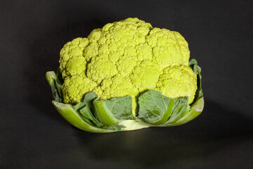 colorful cauliflower on black background