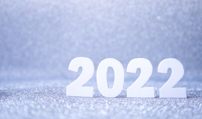 The inscription of 2022 on a silver background.Christmas.Background of the New Year