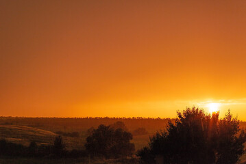 Fototapeta na wymiar rustic orange sunset ukrainian sunset landscape gradient cloudy sky