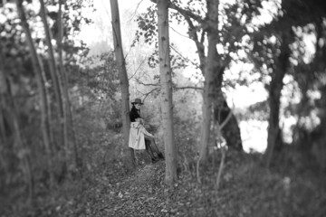 Obraz premium Black and white conceptual portrait of a woman in the forest