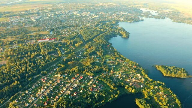 Old Lyepyel, Lepel Lake, Beloozerny District, Vitebsk Region. Aerial View Of Residential Area With Houses In Countryside. Morning Fog Above Lepel Lake. Top View Of European Nature From High Attitude