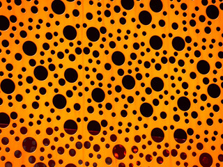 Abstract Orange Polkadot Pattern on Metal Sheets in Medellin, Colombia Metro Station