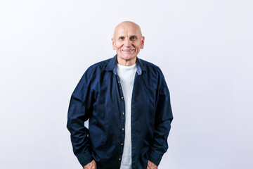 Handsome old male person wearing dark blue shirt posing in studio