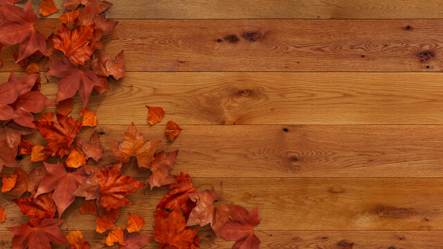 Thanksgiving Background with Fall leaves on Natural wood Tabletop.