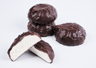 Marshmallow in chocolate glaze close up isolated on white background, clipping path