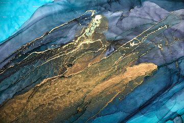 Luxury abstract background in alcohol ink technique, indigo blue gold liquid painting, scattered...