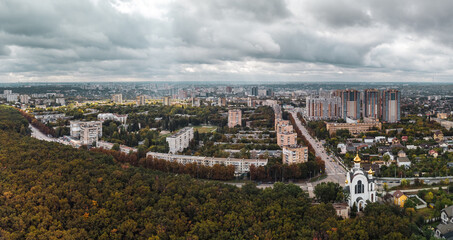 Cityscape aerial panorama with dramatic clouds. Kharkiv city Pavlovo Pole district, view on Nauky...