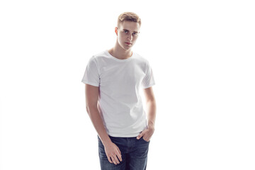 Young man in white t-shirt. Mock-up.