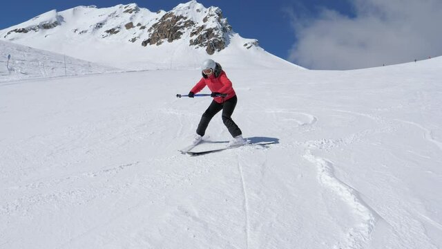 Beginner Skier Learns To Ski In Winter In Snowy Mountains