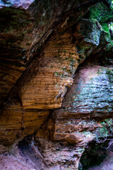 Sandstone rocks with green vegetation