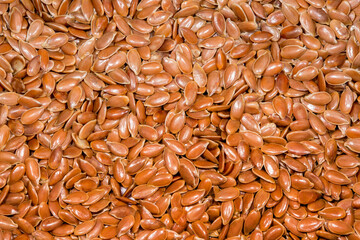 Flax seeds close-up as a background macro