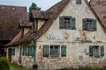 Fototapeta na wymiar an old Franconian half-timbered house with a decayed facade 