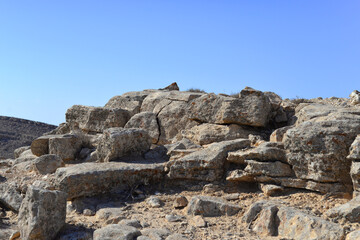 Mountain landscape, desert. Makhtesh Ramon Crater in Negev desert, Israel. Stony desert panoramic view. Unique relief geological erosion land form. National park Makhtesh Ramon or Ramon Crater