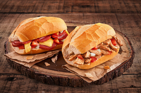 Lanche de Pernil com vinagrete e Lanche de lingui&ccedil;a calabresa com queijo derretido