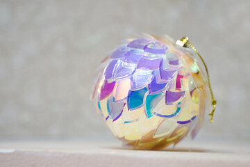 Shiny Christmas ball in the form of a multi-colored cone