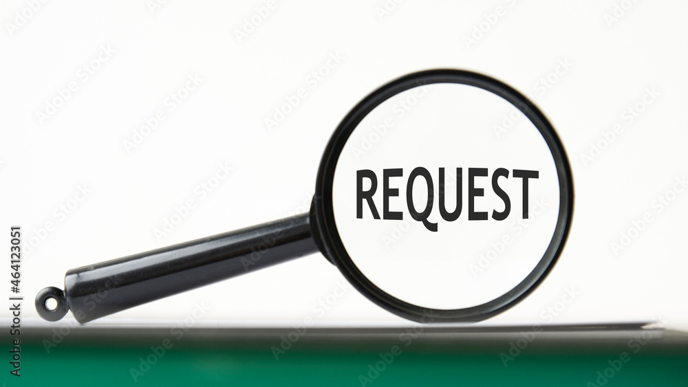 Poster magnifying glass with text request on notebook
