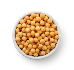 Top view of dried yellow peas in ceramic bowl