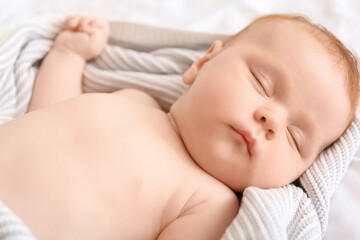Fototapeta na wymiar Little baby sleeping on bed