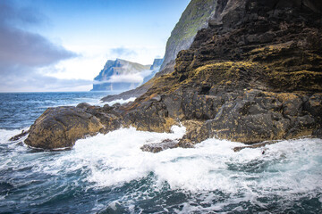 cliffs with morning fog, vestmanna, streymoy, faroe islands, north atlantic, europe