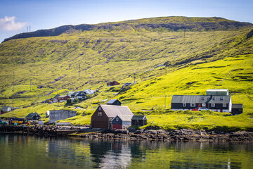 fishing huts in vestmanna village,  streymoy island, faroe islands, north atlantic, europe