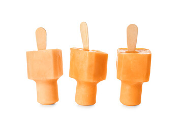 Tasty melon popsicles on white background