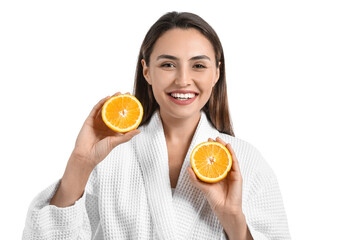 Beautiful young woman with fresh orange on white background
