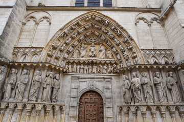 Burgos, Spain - 16 Oct, 2021: Elaborate stone carvings at the entrance to Santa Maria Cathedral, Burgos