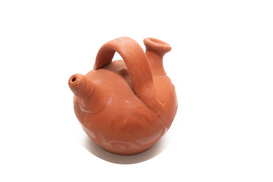 "Botijo, bucaro". Traditional Spanish drink container used to keep water or other liquids fresh. Made with clay. Traditional concept.