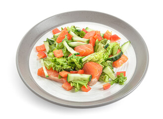 Delicious salad with salmon and vegetables in plate on white background