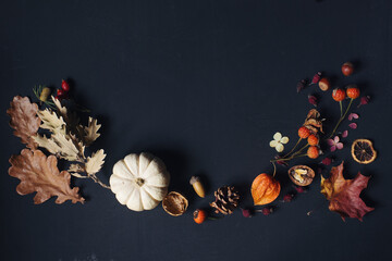Autumn or thanksgiving composition with leaves, pumpkin,nuts and corns