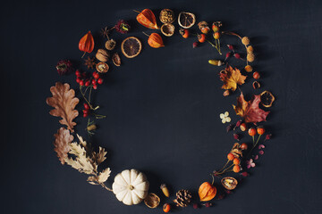 Autumn or thanksgiving composition with leaves, pumpkin,nuts and corns