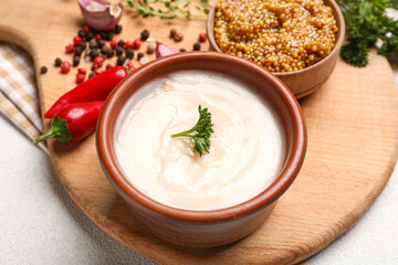 Bowl of lard spread and spices on white background