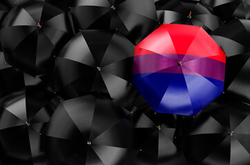 Umbrella with bisexual flag among black umbrellas, 3D rendering