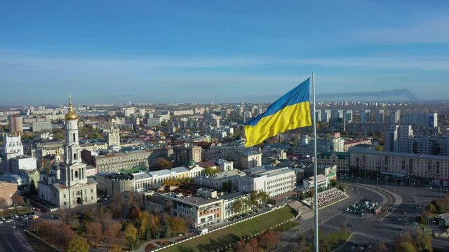 Aerial view to highest ukrainian flag on embankment in Kharkiv