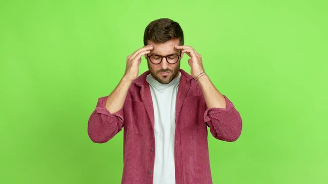 Handsome man with glasses with headache over isolated background