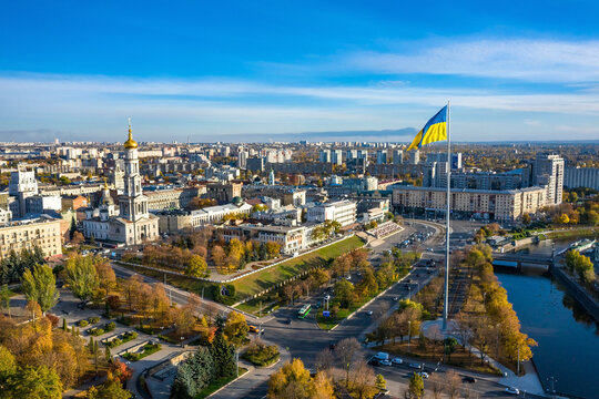 Aerial view to highest ukrainian flag on embankment in Kharkiv