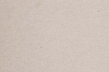Texture of vintage paper, cardboard, recyclable material with inclusions, grunge background