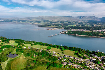 Aerial view of Garth Pier with snowdonia landscape in the distance from Anglesey