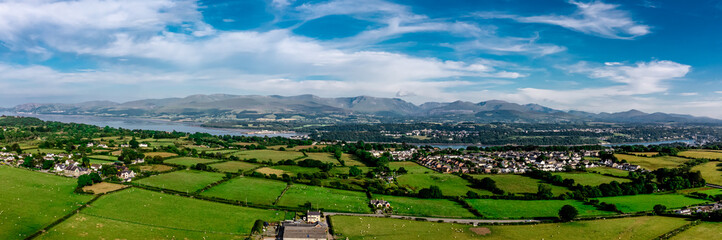 Fototapeta na wymiar Aerial view of snowdonia landscape in the distance from Anglesey
