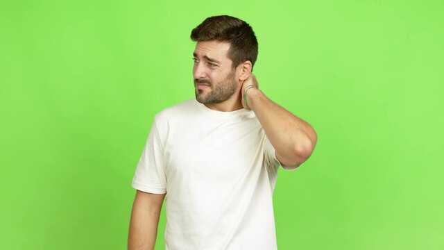 Handsome man with neck pain over isolated background